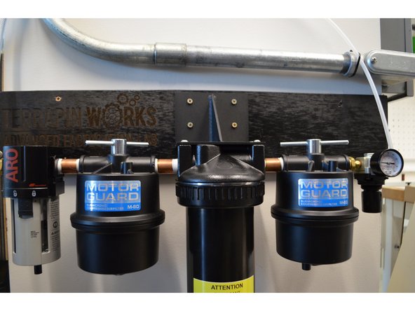 Check the color of the desiccant in the air filtration system