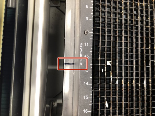 The cutting bed should be keyed into place and aligned with the marks