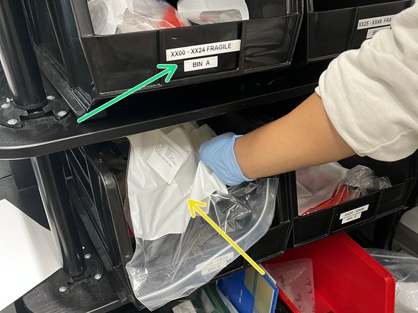 Looking at the order number, place the model in the correct bin.