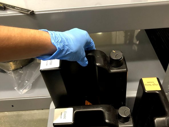 Retrieve the cartridge from the specified storage location