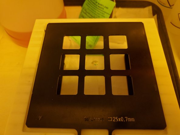 Flip the sample holder so the top side is facing upwards.