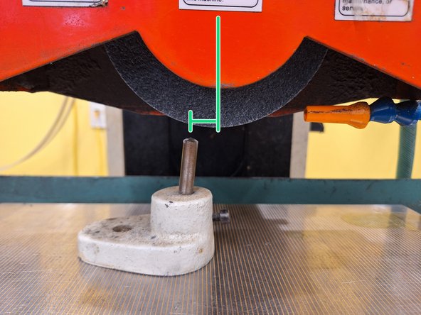 You'll need to dress the wheel with the diamond tipped dressing rod before you do any surface grinding.