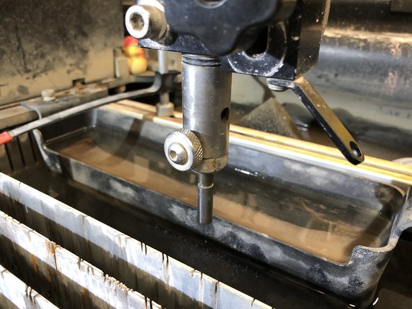 Flip nozzle around and insert it back into the sprayer upside-down (like 3rd picture), and re-tighten bolt.