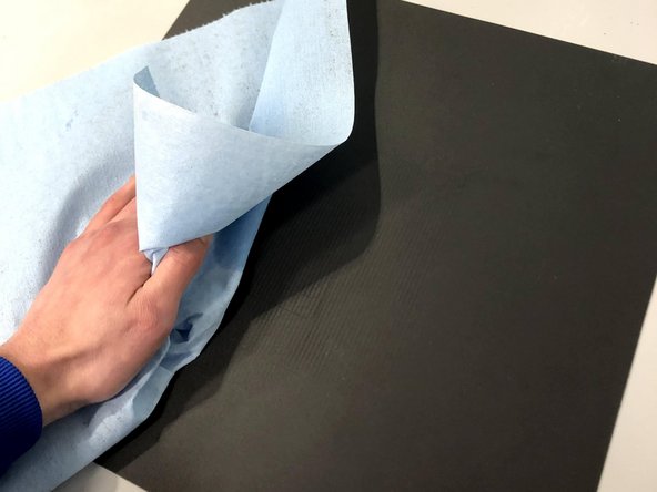 Using a paper towel wipe the build plate clean with IPA
