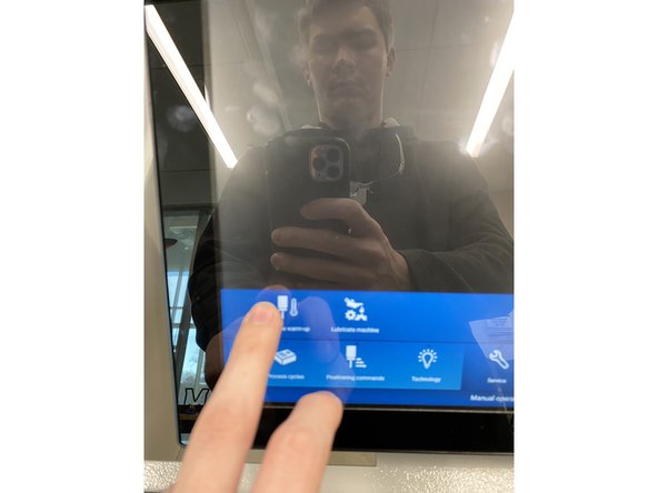 Click on the spindle warm-up icon as shown.