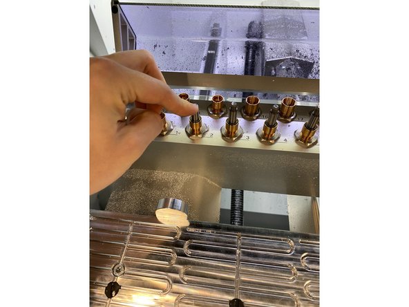 Now insert the tool into the magazine, pushing it down firmly, then selecting okay on the screen saying the tool has been changed.