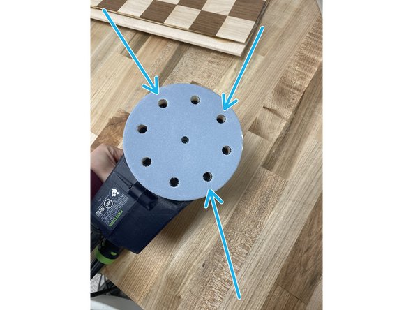 To change a sheet, peel off the old one, and apply the new one by lining up the holes of the sheet and the sander.