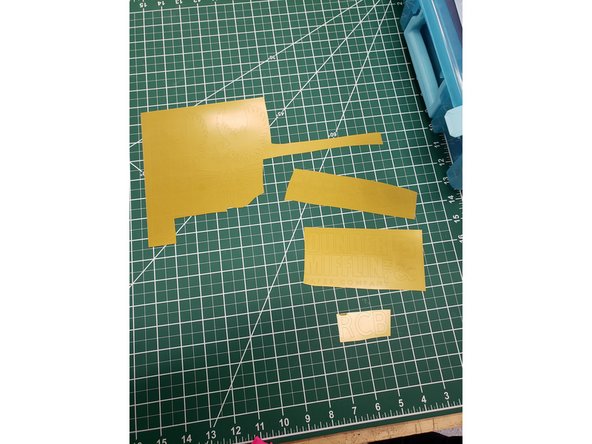 Cut out the portions of the vinyl where your cutouts are