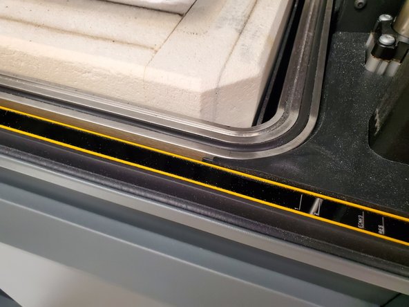 The retort is made out of graphite, and serves to direct forming gas in laminar flow over the parts inside