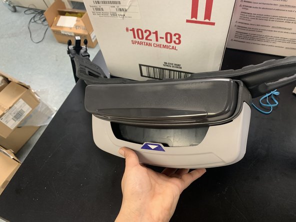 Attach the battery pack to the bottom of the waistband until you hear the click