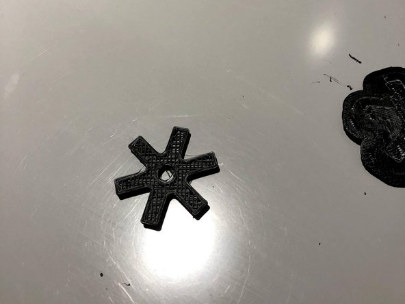 For more complex parts, the raft may require some poking and prodding from the spatula- use gloves to avoid cuts