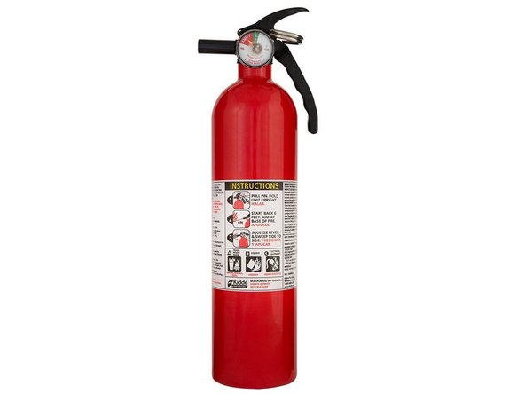 Materials such as wood and acrylic are flammable, so a fire extinguisher is located next to the machine