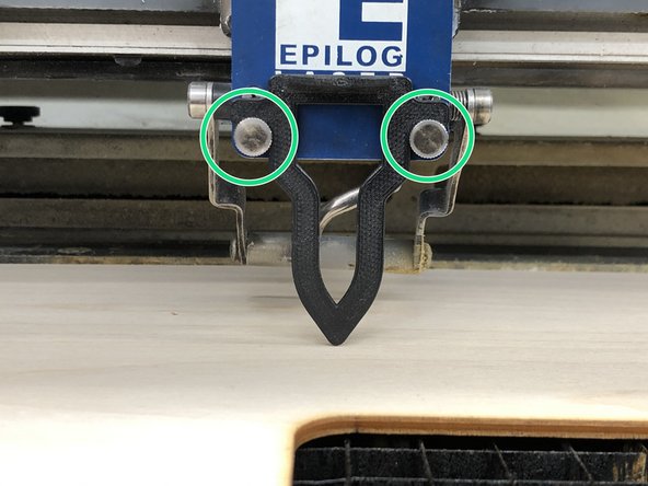 Hang it on the front studs of the gantry