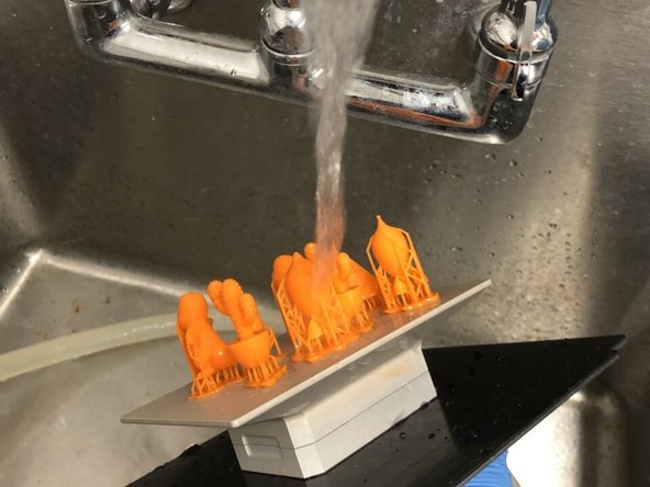 If there is residual resin left over, spray the parts with IPA and run another washing cycle. Repeat this step until there is no visible residual resin.
