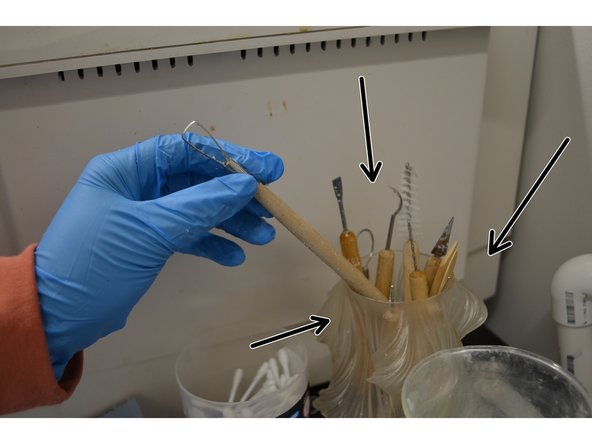 Using the carving tools on the workstation, try to remove as much support material as possible.