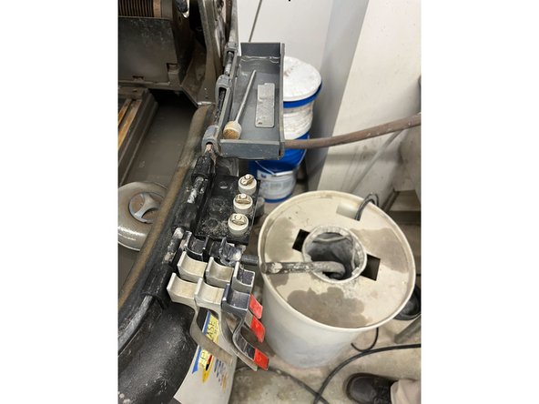 Rinse the clamps and everything hanging on the side in the sink and put it back neatly