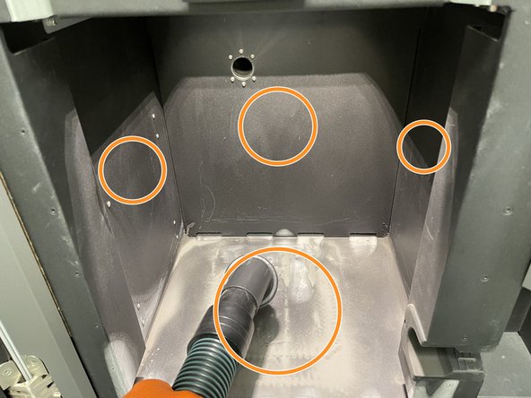 If the build chamber is inserted, remove it and place it in the Fuse post-processing station.