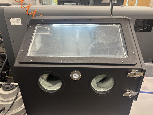 Step 3: Take a second to look in and observe the now-lit internal cavern. You should see the main static nozzle fixed near the center top (Picture 2). You should also see the inner air sand gun (Picture 3).