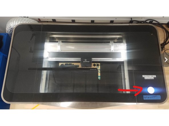 Place your stock in the bed of the laser cutter, making sure that it lays flat  and that the door is closed