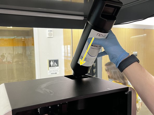 Insert the cartridge into the machine.