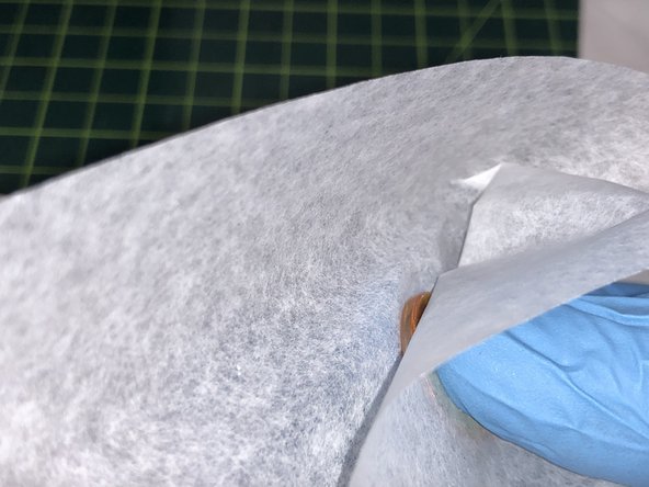 Do not touch the faces of the lens with your bare hands. Only use lens paper to handle the lens.