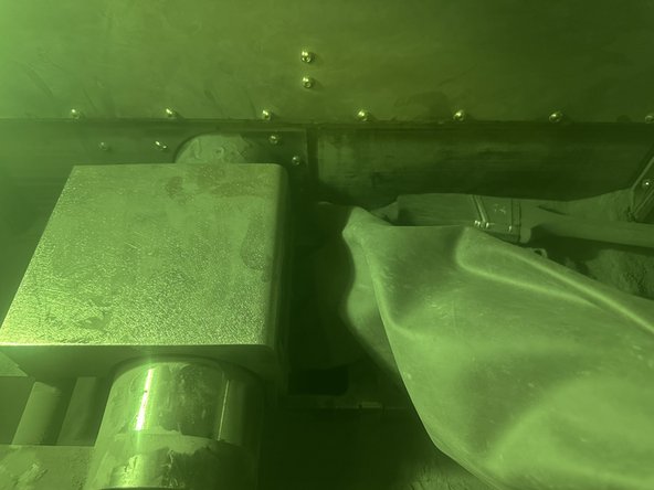 Keep your hand relatively parallel with the underside of the Carriage. This will minimize the already unlikely chance of the Roller grabbing the glove.