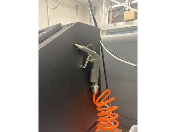 Take notice of the external air hose as well as the TigerVac vacuum on the left of the Sandblaster