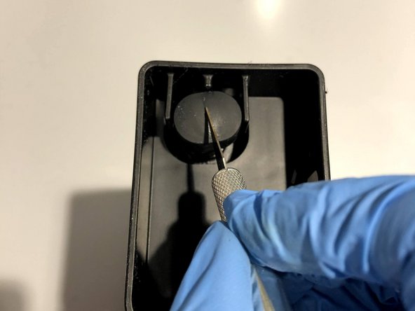 Remove the orange tab from the bottom nipple and place it in the same box that you just got the tank out of