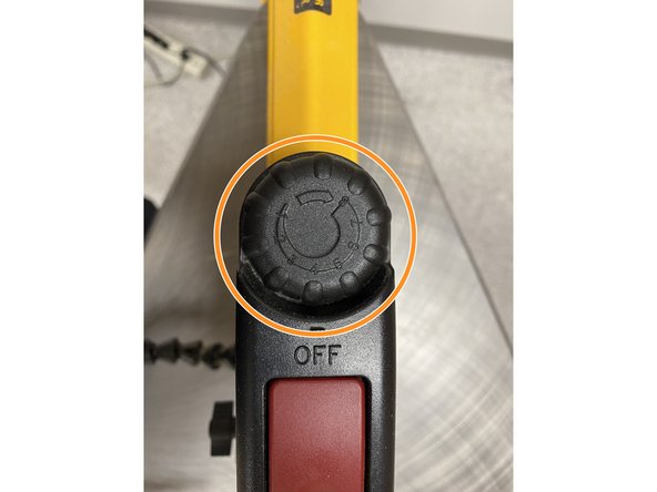 If the saw is moving too slow or too fast, adjust the speed with the black circle knob on the top of the scroll saw.