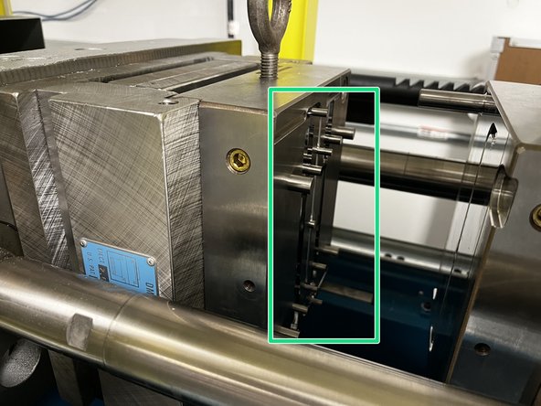 Press the ejector pin advance button to eject the pins.