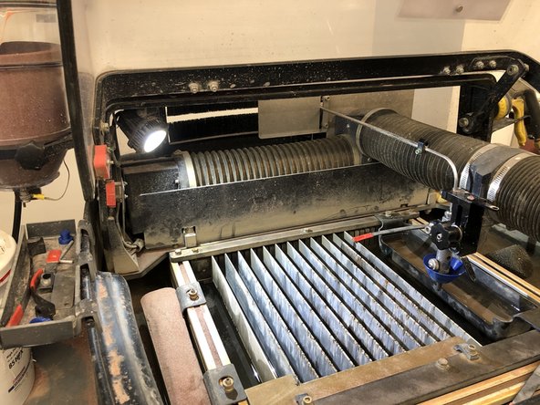 Green Circle - Slid into the grinte block and cutting head, just slides right out