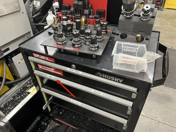 From the parallels drawer to the right of the Trak, select a pair of parallels which will hold the build plate up so that the top of the build plate clears the edges of the clamp jaws. (the 1 3/8&quot; offsets are typically preferable here)