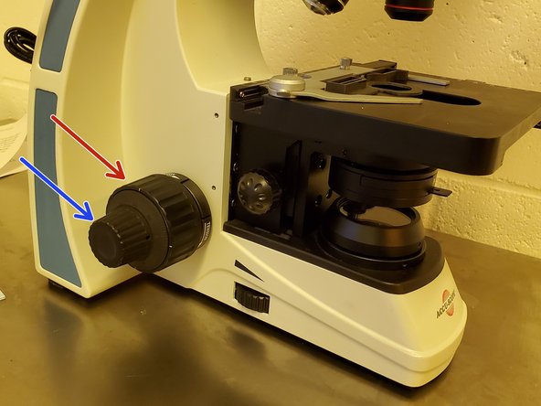 Use the coarse adjustment knob to bring the stage and the slide closer within range of the objective.
