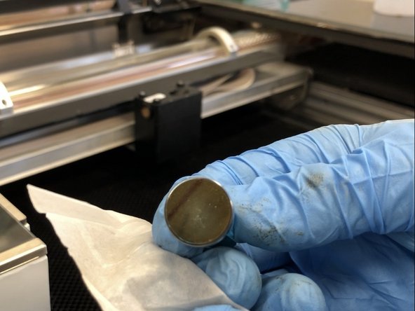 Gently pick up the mirror