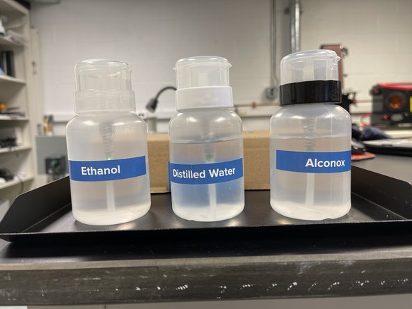 Make sure the side of the optical cassette that DOES NOT have the blue gaskets is facing you.