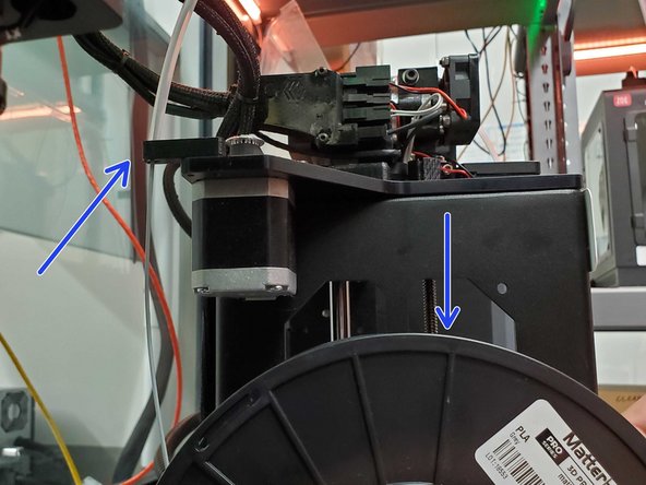 Place your new spool onto the side of the MakerGear and load the filament into the PTFE tube