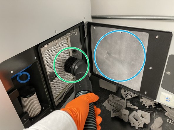 Press down on the button to open the door.