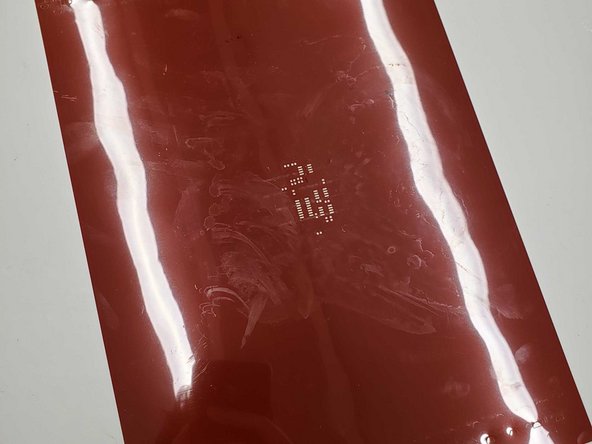 A stencil is used to place solder paste on the pads of the board.