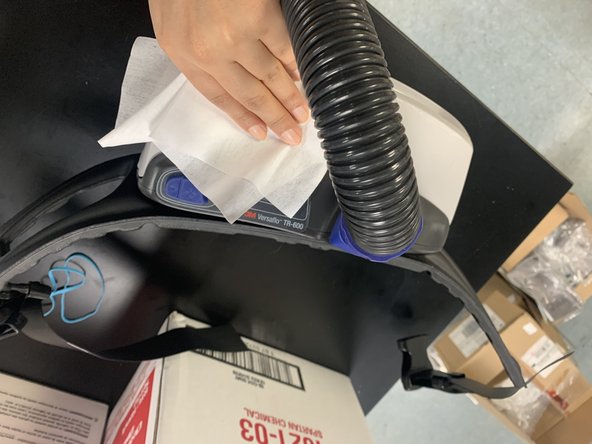 Use spray cleaner to wipe down headpiece and all surfaces before putting equipment back in cabinet.