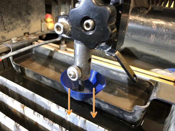 Remove blue skirt by simply sliding it off.