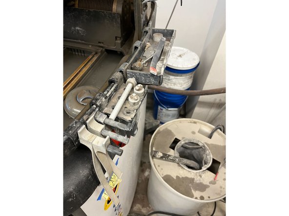 Rinse the clamps and everything hanging on the side in the sink and put it back neatly