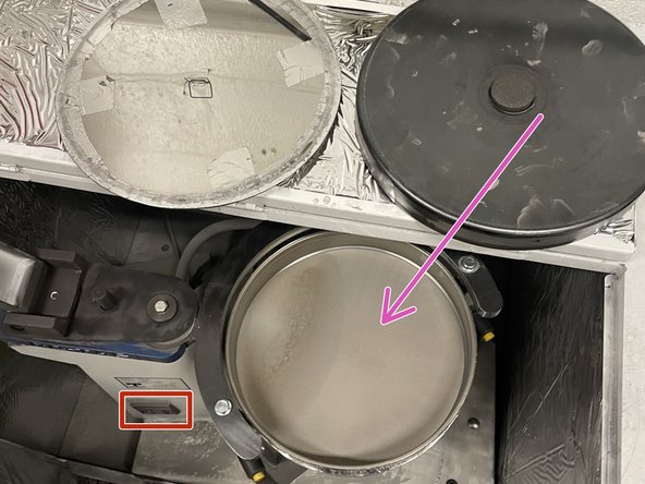 Taking the powder from the overflow collection bottles upend the containers into the the sieve