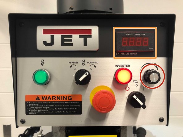 When the machine is on, use the knob to adjust spindle speed