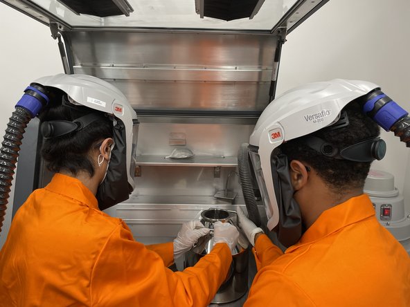 With a partner, transfer the store keg into the powder station