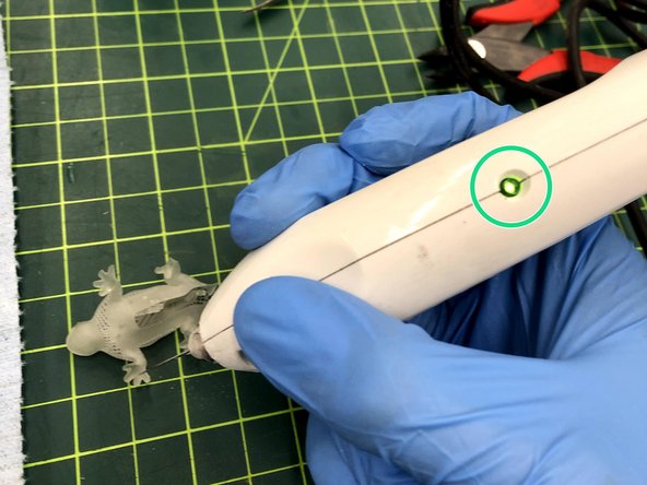 Flip the side switch so that the light turns green