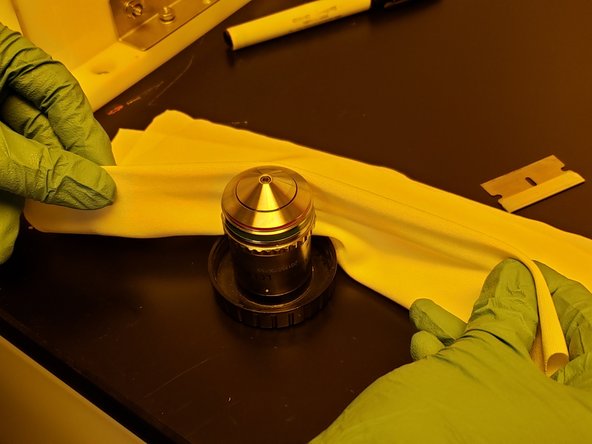 Fold the microfiber cloth in half.