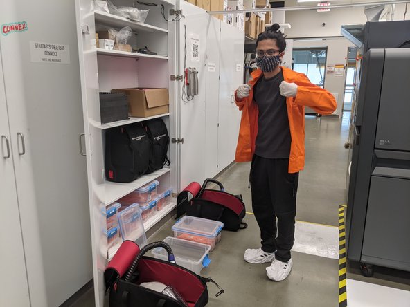 Bring the airtight container with jacket inside to within the Powder Exclusion Zone (PEZ)