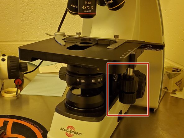 Use the stage controls to move the slide until the print is in view.