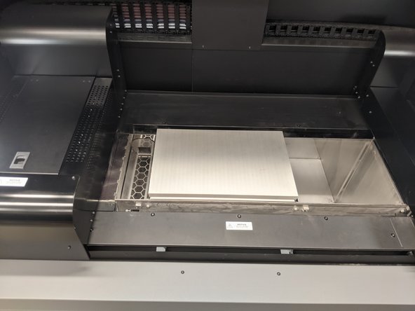 Use the up arrow to raise the build piston to maximum height