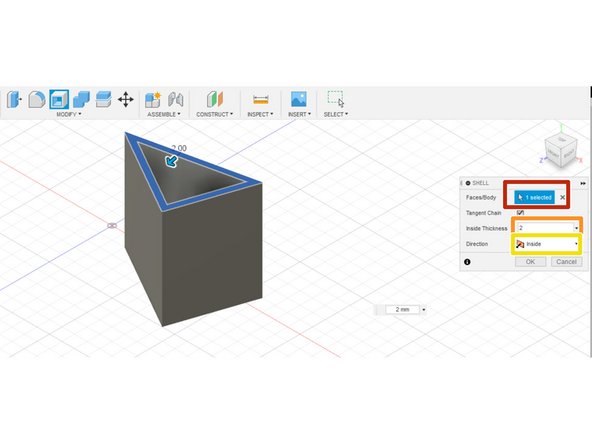 The shell tool removes selected faces and hollows out the solid body to create a thin-walled structure